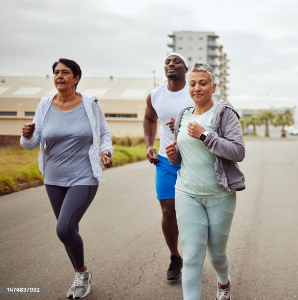 Two runners confidently running together in a safe, well-lit environment